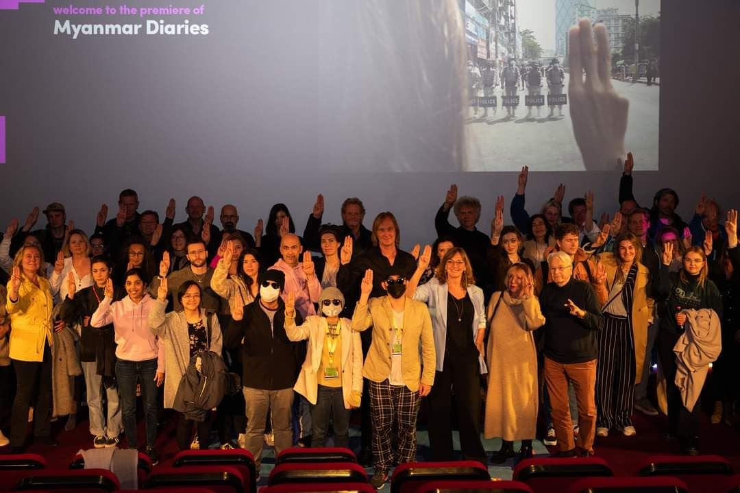 Audience doing the three-finger salute at a Myanmar Diaries screening